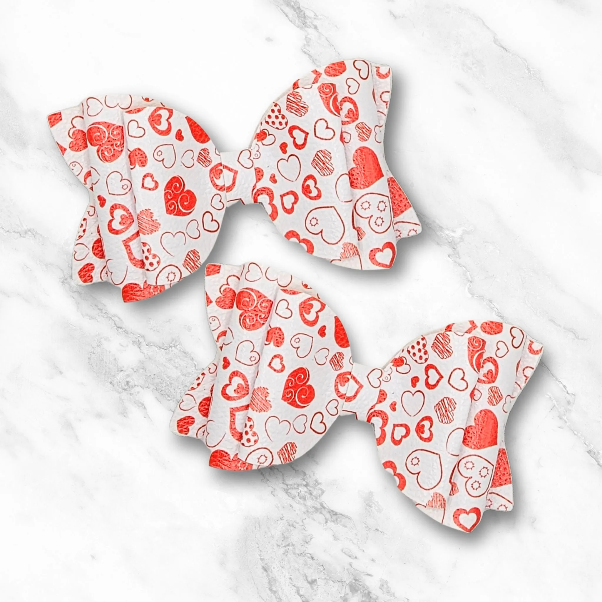 Josie - Passion Hearts Faux Leather Hair Bow